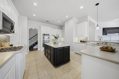 Located in the guard-gated Heritage Lakes community of west on Heritage Lakes - Par 3 - 9 Hole Course in Texas - for sale on GolfHomes.com, golf home, golf lot