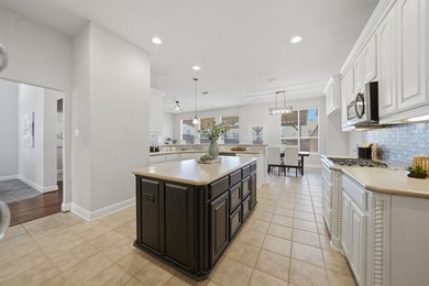 Located in the guard-gated Heritage Lakes community of west on Heritage Lakes - Par 3 - 9 Hole Course in Texas - for sale on GolfHomes.com, golf home, golf lot