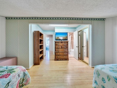This beautiful 2 bedroom PLUS loft, making the condo live like a on Seascape Golf Course in Florida - for sale on GolfHomes.com, golf home, golf lot