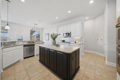 Located in the guard-gated Heritage Lakes community of west on Heritage Lakes - Par 3 - 9 Hole Course in Texas - for sale on GolfHomes.com, golf home, golf lot