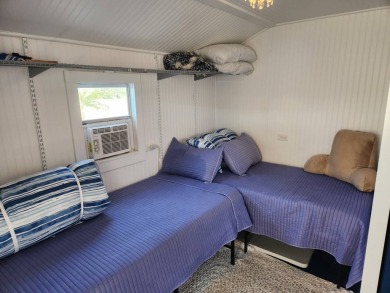 This primo lot in the luxury motorcoach section is once again on Deer Creek RV Golf Resort in Florida - for sale on GolfHomes.com, golf home, golf lot