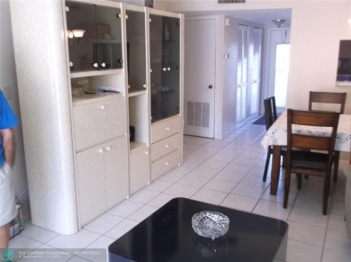 LOVELY 2 BEDROOM 2 BATH CONDO IN FABULOUS SUNRISE LAKES PHASE 3 on Sunrise Lakes Phase III in Florida - for sale on GolfHomes.com, golf home, golf lot