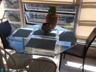 LOVELY 2 BEDROOM 2 BATH CONDO IN FABULOUS SUNRISE LAKES PHASE 3 on Sunrise Lakes Phase III in Florida - for sale on GolfHomes.com, golf home, golf lot