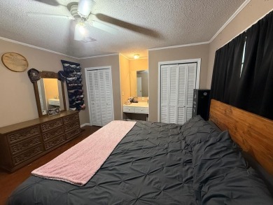 This home features a spacious layout with covered front and back on The Kings Arrow Ranch in Mississippi - for sale on GolfHomes.com, golf home, golf lot