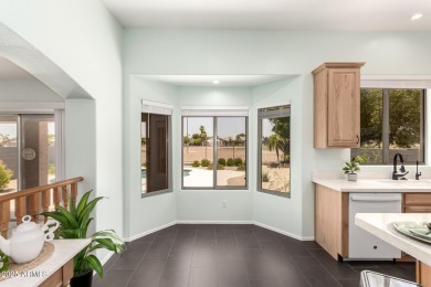 This pristine home offers rare golf course frontage in both the on Greenfield Lakes Golf Club in Arizona - for sale on GolfHomes.com, golf home, golf lot