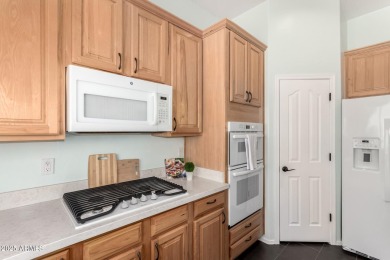 This pristine home offers rare golf course frontage in both the on Greenfield Lakes Golf Club in Arizona - for sale on GolfHomes.com, golf home, golf lot