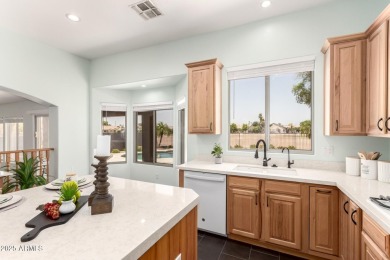 This pristine home offers rare golf course frontage in both the on Greenfield Lakes Golf Club in Arizona - for sale on GolfHomes.com, golf home, golf lot