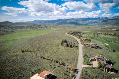 This gently sloped 2 acre lot overlooks the 14th fairway of the on Glenwild Golf Club and Spa in Utah - for sale on GolfHomes.com, golf home, golf lot