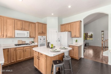 This pristine home offers rare golf course frontage in both the on Greenfield Lakes Golf Club in Arizona - for sale on GolfHomes.com, golf home, golf lot