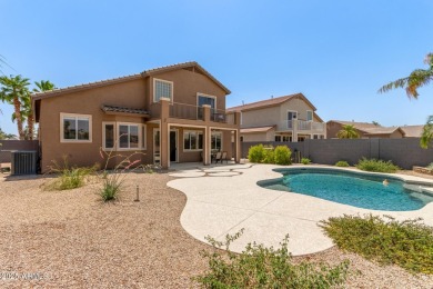 This pristine home offers rare golf course frontage in both the on Greenfield Lakes Golf Club in Arizona - for sale on GolfHomes.com, golf home, golf lot