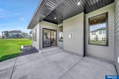 Custom designed by MK Builders, this brand new 4 bedroom, 3 bath on HiMark Golf Course in Nebraska - for sale on GolfHomes.com, golf home, golf lot