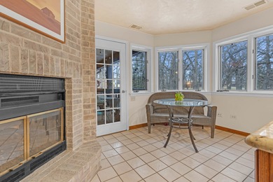 Discover the perfect blend of comfort and elegance in this on Oak Hills Country Club in Illinois - for sale on GolfHomes.com, golf home, golf lot