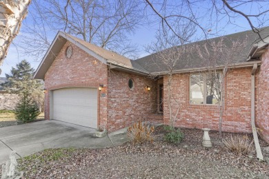 This is a meticulously maintained, all brick, walk-out basement on Horton Smith Golf Course in Missouri - for sale on GolfHomes.com, golf home, golf lot