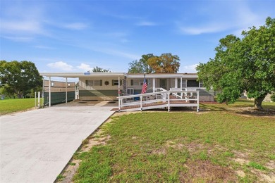 Step into a home that feels welcoming from the moment you arrive on High Point Golf Club, Inc. in Florida - for sale on GolfHomes.com, golf home, golf lot