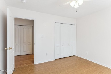 Freshly painted with hardwood floors in main living area on Knoxville Golf Course in Tennessee - for sale on GolfHomes.com, golf home, golf lot