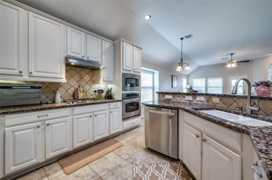 Perfectly situated in Frisco's Heritage Lakes, a gated community on Heritage Lakes - Par 3 - 9 Hole Course in Texas - for sale on GolfHomes.com, golf home, golf lot