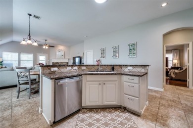 Perfectly situated in Frisco's Heritage Lakes, a gated community on Heritage Lakes - Par 3 - 9 Hole Course in Texas - for sale on GolfHomes.com, golf home, golf lot