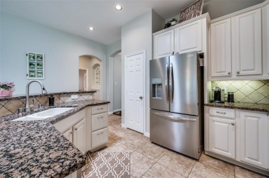 Perfectly situated in Frisco's Heritage Lakes, a gated community on Heritage Lakes - Par 3 - 9 Hole Course in Texas - for sale on GolfHomes.com, golf home, golf lot
