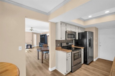 Beautiful and spacious 2-bedroom, 2-bath Camelot Village villa on Highland Lakes Executive Golf Course in Florida - for sale on GolfHomes.com, golf home, golf lot