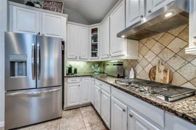 Perfectly situated in Frisco's Heritage Lakes, a gated community on Heritage Lakes - Par 3 - 9 Hole Course in Texas - for sale on GolfHomes.com, golf home, golf lot