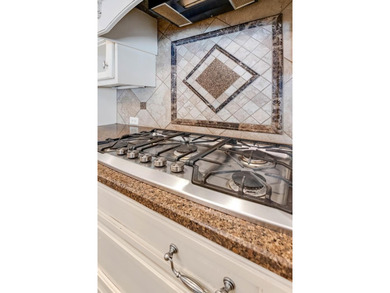 This home offers 4 bedrooms, 3 full baths, and 3,480 square feet on Kinderlou Forest Golf Club in Georgia - for sale on GolfHomes.com, golf home, golf lot