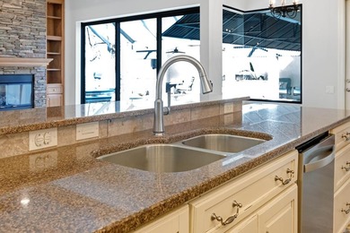 This home offers 4 bedrooms, 3 full baths, and 3,480 square feet on Kinderlou Forest Golf Club in Georgia - for sale on GolfHomes.com, golf home, golf lot