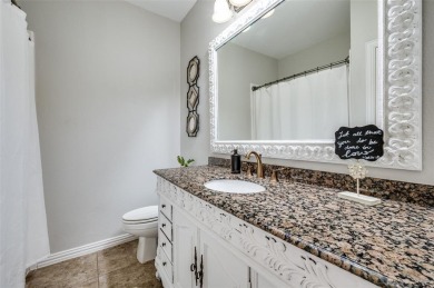 Perfectly situated in Frisco's Heritage Lakes, a gated community on Heritage Lakes - Par 3 - 9 Hole Course in Texas - for sale on GolfHomes.com, golf home, golf lot