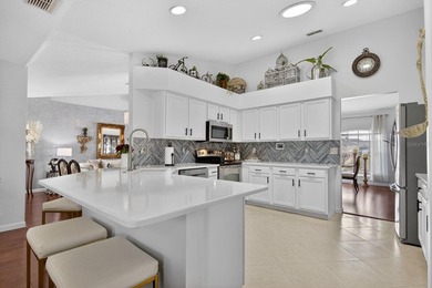 Welcome to this beautifully updated, move-in ready home located on Tampa Bay Golf and Country Club in Florida - for sale on GolfHomes.com, golf home, golf lot