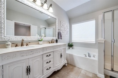 Perfectly situated in Frisco's Heritage Lakes, a gated community on Heritage Lakes - Par 3 - 9 Hole Course in Texas - for sale on GolfHomes.com, golf home, golf lot