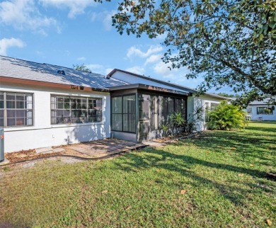 Beautiful and spacious 2-bedroom, 2-bath Camelot Village villa on Highland Lakes Executive Golf Course in Florida - for sale on GolfHomes.com, golf home, golf lot