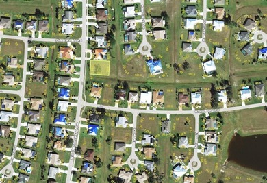 Welcome to 2116 Rio De Janeiro Ave, a HUGE 90' x 120' MOSTLY on Deep Creek Golf Club in Florida - for sale on GolfHomes.com, golf home, golf lot