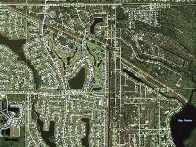 Welcome to 2116 Rio De Janeiro Ave, a HUGE 90' x 120' MOSTLY on Deep Creek Golf Club in Florida - for sale on GolfHomes.com, golf home, golf lot