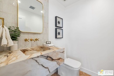 A rare blend of architectural scale, designer finishes, and on Indian Canyons Golf Resort - North Course in California - for sale on GolfHomes.com, golf home, golf lot