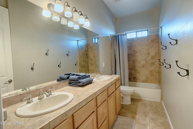 Located just off the 4th green of the Snowflake golf course on Snowflake Municipal Golf Course in Arizona - for sale on GolfHomes.com, golf home, golf lot