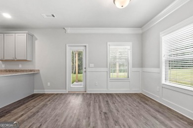 GO UNDER CONTRACT IN MARCH AND RECEIVE A FREE WASHER, DRYER AND on Griffin Country Club in Georgia - for sale on GolfHomes.com, golf home, golf lot