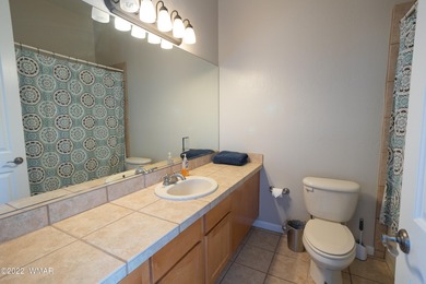 Located just off the 4th green of the Snowflake golf course on Snowflake Municipal Golf Course in Arizona - for sale on GolfHomes.com, golf home, golf lot