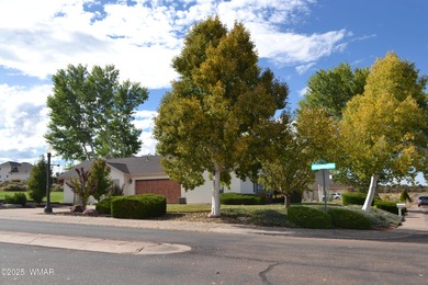 Located just off the 4th green of the Snowflake golf course on Snowflake Municipal Golf Course in Arizona - for sale on GolfHomes.com, golf home, golf lot