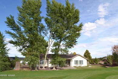 Located just off the 4th green of the Snowflake golf course on Snowflake Municipal Golf Course in Arizona - for sale on GolfHomes.com, golf home, golf lot