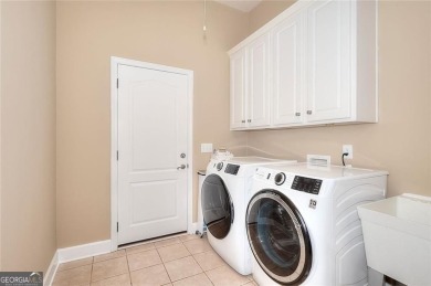Wonderful 3 Bedroom 2 1/2 bath all brick ranch home with a full on The Providence Club in Georgia - for sale on GolfHomes.com, golf home, golf lot