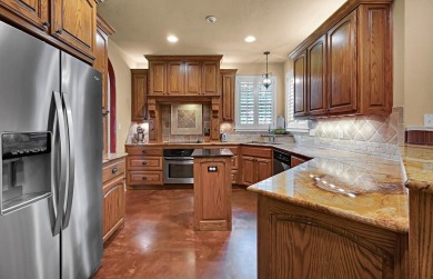 This 4-bedroom, 2.5-bathroom home features a spacious living on Twin Rivers Golf Club in Texas - for sale on GolfHomes.com, golf home, golf lot