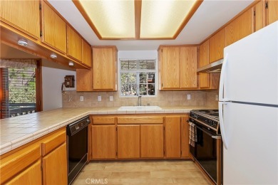 This is the first time on the market for this charming home in on Lake Arrowhead Country Club in California - for sale on GolfHomes.com, golf home, golf lot