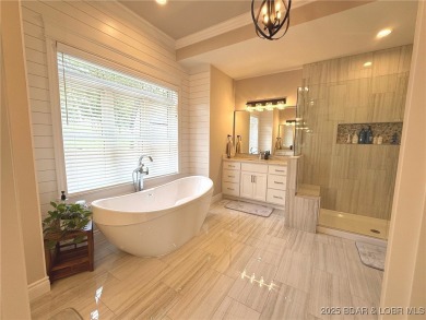Introducing East Villages! An exquisite lakefront property on The Club At Porto Cima in Missouri - for sale on GolfHomes.com, golf home, golf lot
