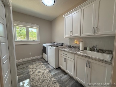 Introducing East Villages! An exquisite lakefront property on The Club At Porto Cima in Missouri - for sale on GolfHomes.com, golf home, golf lot