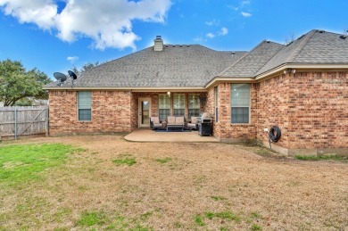 This 4-bedroom, 2.5-bathroom home features a spacious living on Twin Rivers Golf Club in Texas - for sale on GolfHomes.com, golf home, golf lot