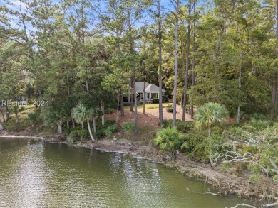 Charming Marsh-Front Retreat on Callawassie Island. This unique on Callawassie Island Club in South Carolina - for sale on GolfHomes.com, golf home, golf lot