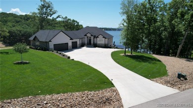 Introducing East Villages! An exquisite lakefront property on The Club At Porto Cima in Missouri - for sale on GolfHomes.com, golf home, golf lot