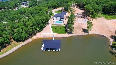 Introducing East Villages! An exquisite lakefront property on The Club At Porto Cima in Missouri - for sale on GolfHomes.com, golf home, golf lot