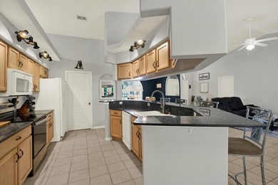 Welcome to your own private slice of Florida living in the heart on Oak Hills Country Club in Florida - for sale on GolfHomes.com, golf home, golf lot