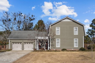 Discover this delightful 4 bedroom, 3 1/2 bath home that on Jacksonville Country Club in North Carolina - for sale on GolfHomes.com, golf home, golf lot