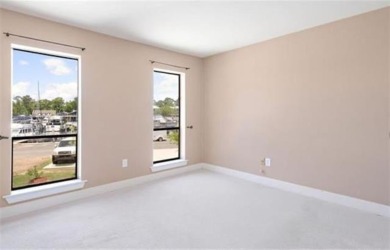 Welcome to your dream waterfront condo just steps away from the on Beau Chene Country Club in Louisiana - for sale on GolfHomes.com, golf home, golf lot
